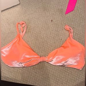 Bright orange bathing suit top!